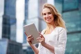 Person reading a techmarsh how-to guide on a tablet at home